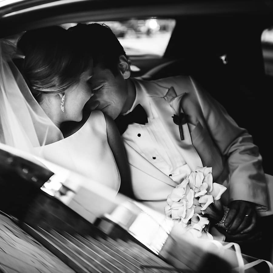 Couple kissing in limo